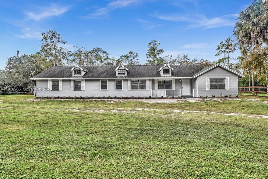 REMARKABLE RANCH STYLE HOME ON 2.5 PLUS ACRES. THE HOME IS PERFECT FOR ALMOST ANY FAMILY WITH ENOUGH SPACE. THE KITCHEN IS EXTRA LARGE FOR AMAZING DINNERS AND GREAT HOSPITALITY. THERE'S A GIANT FAMILY ROOM WHERE UNFORGETTABLE MEMORIES WILL BE CREATED. WHEN IT COMES TIME TO ENJOY THE FLORIDA WEATHER,  WOW! THERE IS PLENTY OF SPACE FOR THE FAMILY AND FOR MOSTLY ANYTHING TO MAKE YOU HAPPY. YOU HAVE YOUR OWN POND TO ENJOY THE OUTDOORS. THERE IS WORKSHOP AND A STABLE AND SPACE FOR MORE. YOU CAN PARK YOUR RV OR BOAT RIGHT ON YOUR PROPERTY ON A CONCRETE SLAB. THERE IS UNLIMITED POTENTIAL. YOU ARE CLOSE TO WELLINGTON AND TO GREAT SHOPPING AND DINING. COME OVER AND VISIT!!