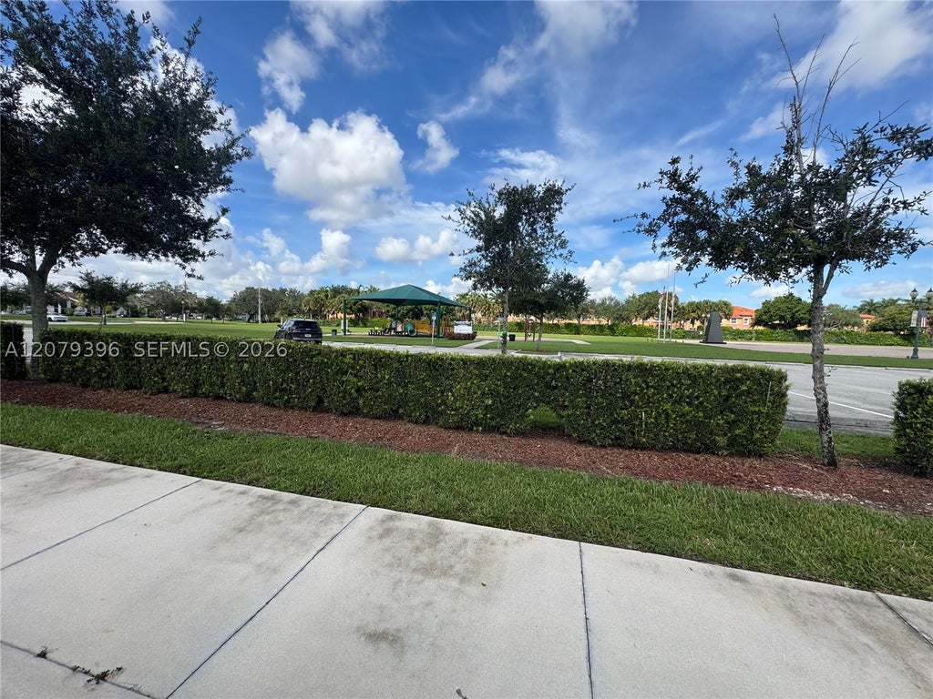 Photo of 744 SW 106th Ave #2001, Pembroke Pines, FL 33025 (MLS # A12079396)