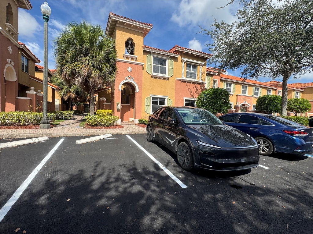 Photo of 744 SW 106th Ave #2001, Pembroke Pines, FL 33025 (MLS # A12079396)