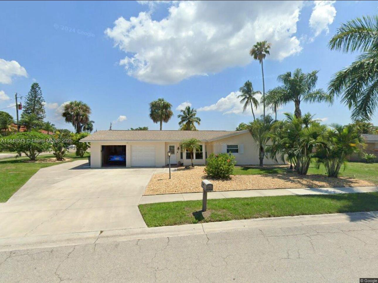 Freshly updated Direct Gulf Access home in Waterway Estates with brand new Boat Dock & Lift. Open floor plan with plenty of indoor and outdoor spaces for entertaining family & guests. 3 large bedrooms, plus 4th room with a closet that can be used as a den or bedroom. Living area 1,650 sq. ft. plus attached air-conditioned Florida room with additional 504 sq. ft. (new AC 2023) Crown molding and new flooring in living areas. Deck with exquisite view of gulf access canal for your boat. Separate covered, brick paved & screened in Lania for outdoor living area. Corner lot with room for pool. New kitchen & appliances (2023). New boat dock & 7000 lb. boat lift (2023). Large interior laundry room. 2 car garage with workshop in rear. Room for 5 vehicles or your motor home. No HOA fees