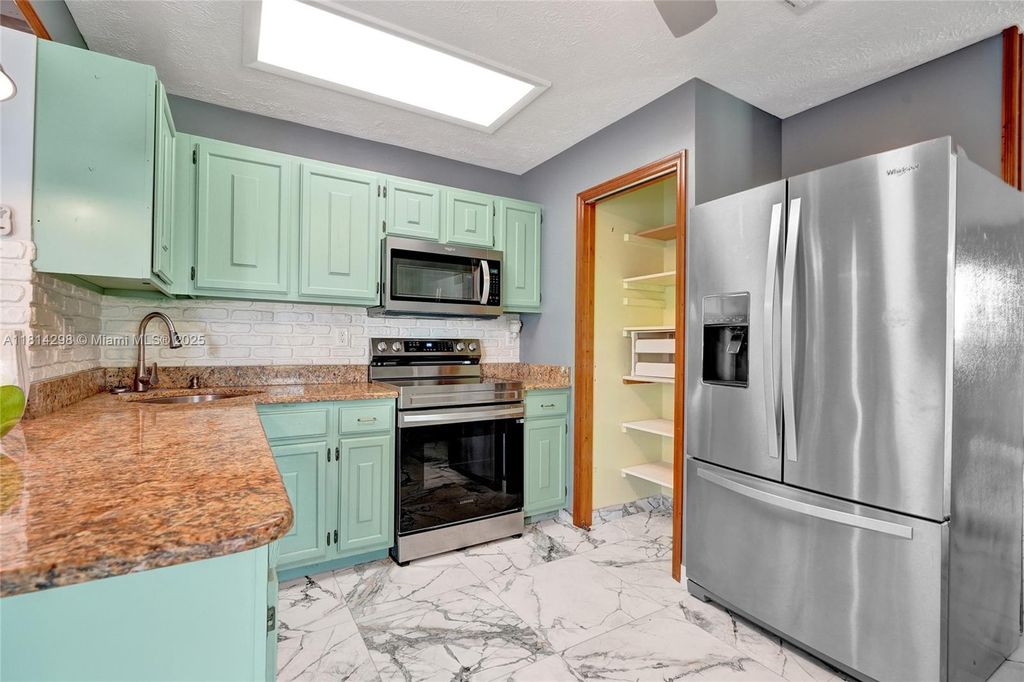 Photo of 2398 SE Bordeaux Ct, Port St Lucie, FL 34952 (MLS # A11814298)