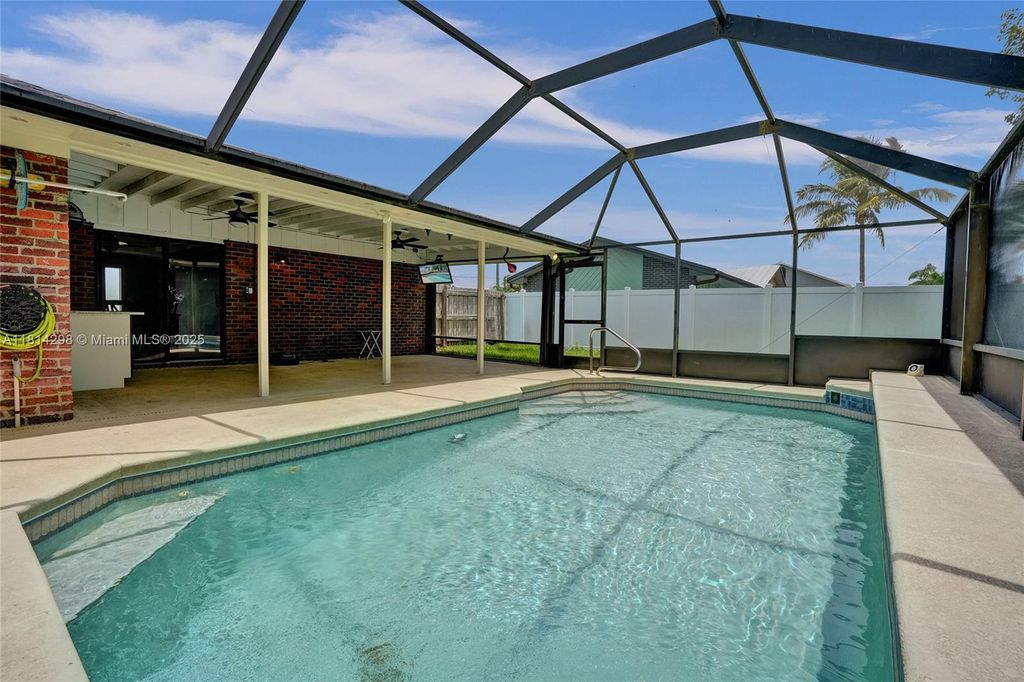 Photo of 2398 SE Bordeaux Ct, Port St Lucie, FL 34952 (MLS # A11814298)