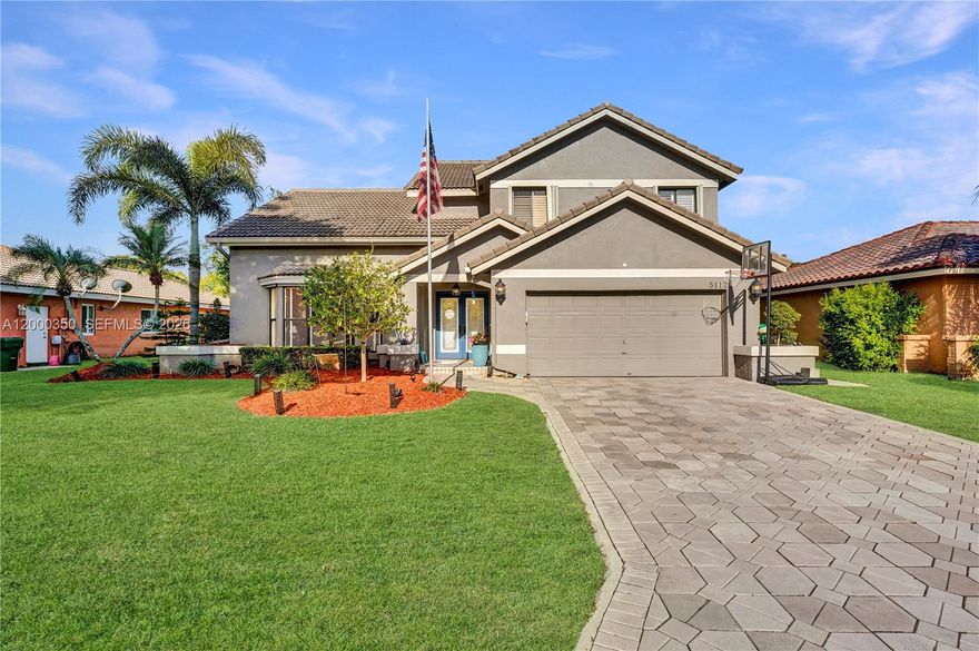 Stunning remodeled 4 bedroom, 3 bath pool home (Oaks model) ready to impress! The renovated kitchen features wood cabinetry with pull out drawers, granite countertops, glass tile backsplash, stainless steel appliances, and a center island with open views to the family room, pool, and patio—perfect for everyday living and entertaining. The spacious layout offers the primary suite and two additional bedrooms upstairs, while the fourth bedroom and full bath are conveniently located on the first floor, ideal for guests or multigenerational living. Interior highlights include rich wood look vinyl flooring, 20x20 tile, and fresh paint throughout. The remodeled primary bath boasts an oversized step in tub, wood cabinetry, and dual sinks. The second bath is updated with honey maple cabinets, granite finishes, and a glass enclosed shower. Hurricane accordion shutters, a 2006 tile roof and newer A/Cs (2025, 2018) add peace of mind. Enjoy a prime location within walking distance to two neighborhood parks, all on a quiet street close to top rated schools, shopping, dining, and major roadways. This move in ready Coral Springs gem offers the perfect combination of style, comfort, and location.