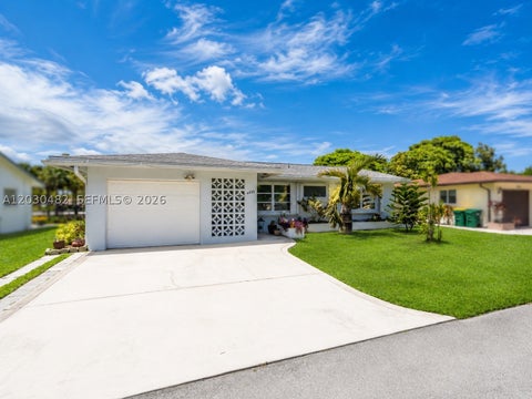 Photo of 4923 NW 55th Ct, Tamarac, FL 33319 (MLS # A12030482)