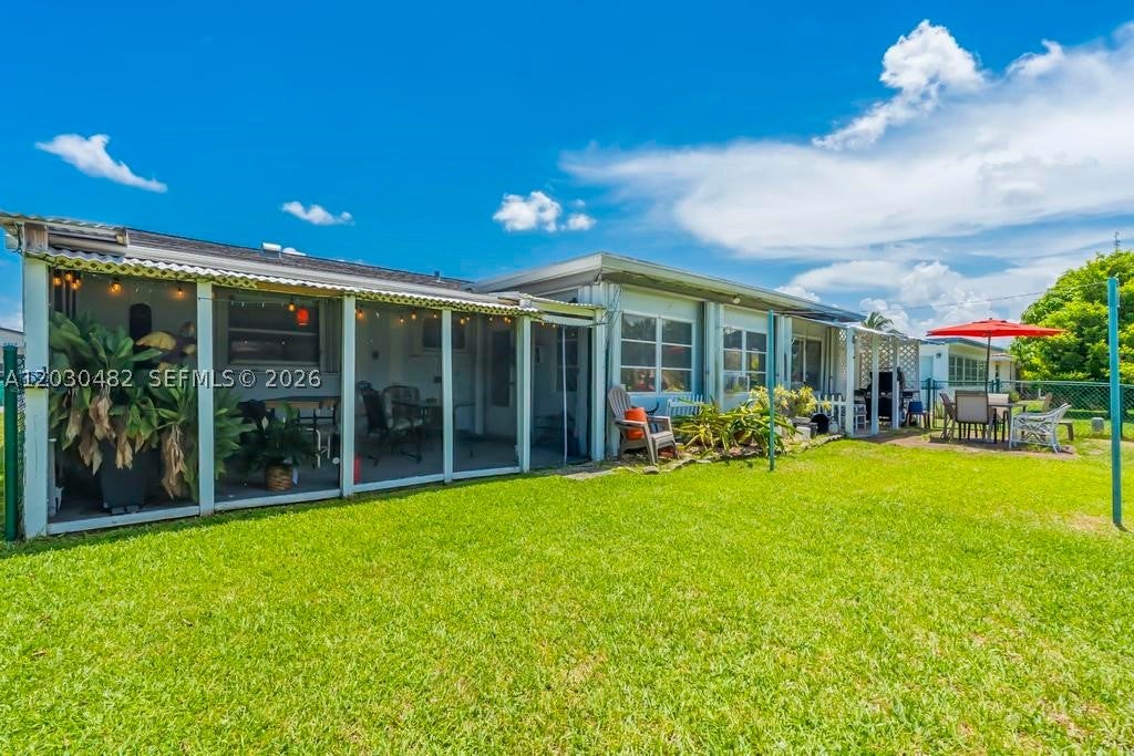 Photo of 4923 NW 55th Ct, Tamarac, FL 33319 (MLS # A12030482)