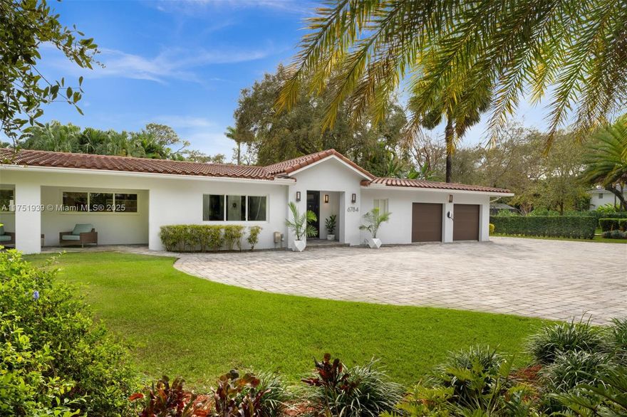 Welcome to this exquisite corner-lot residence, tucked away on a serene & quiet street with no through access, in the heart of Pinecrest. Thoughtfully renovated from 2018 to 2020, this home offers a perfect blend of modern elegance and timeless comfort. This spacious 5-bedroom home boasts porcelain floors throughout, creating a sleek and cohesive design. The primary suite features a spa-like bathroom with a separate tub and shower, dual sinks, large space for an office & his-and-her walk-in closets. Step into a resort-style backyard with two covered terraces, a summer kitchen, a sparkling pool and jacuzzi. Enjoy an illuminated tennis and basketball court for sports enthusiasts. Additional features include a 53-panel, 15kW solar power system. Located close to excellent schools.