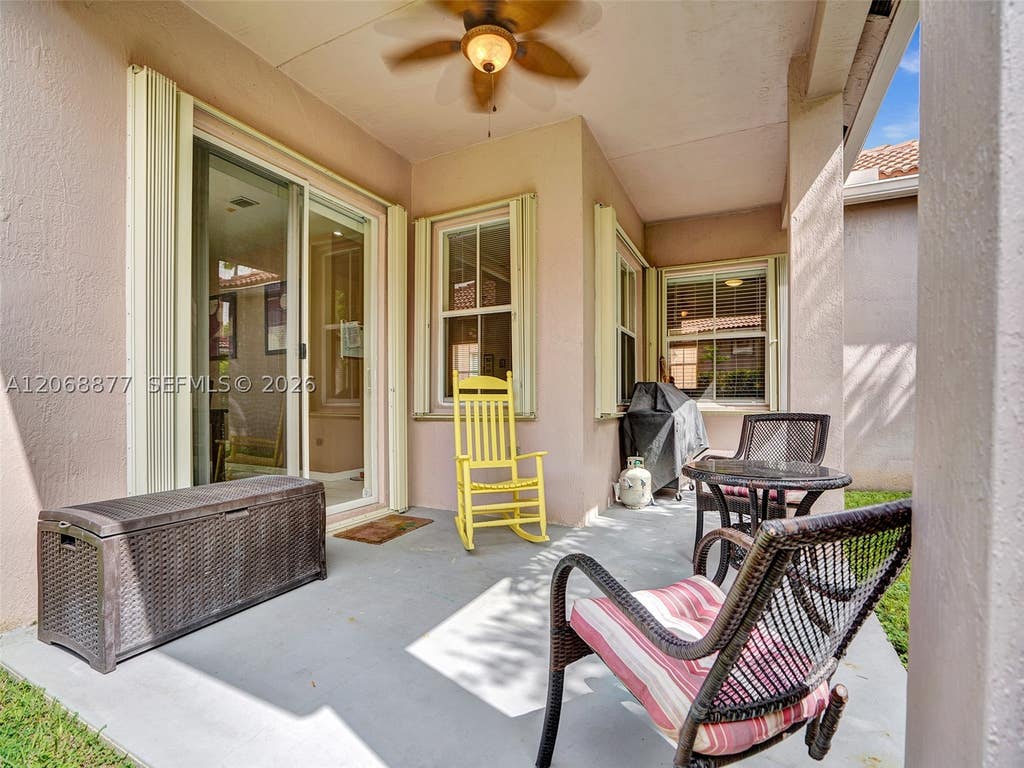 Photo of 938 Bluewood Ter, Weston, FL 33327 (MLS # A12068877)