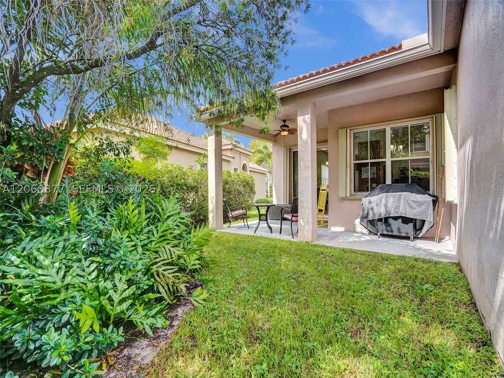 Photo of 938 Bluewood Ter, Weston, FL 33327 (MLS # A12068877)