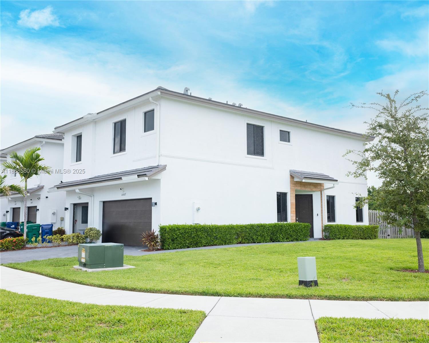 Welcome to this beautiful corner unit 3-bedroom, 2.5-bath townhouse built in 2022, located in the desirable community of Keys at the Landings in Homestead. This modern home offers 1,705 Sq.Ft. of living area with an open-concept layout, a spacious kitchen with stainless steel appliances, and a one-car garage plus driveway for two vehicles. Enjoy extra natural light and privacy from its corner location, with tile floors downstairs and carpet upstairs. HOA includes AT&T high-speed internet (1GIG) and access to community amenities. Conveniently located near shopping, dining, schools, and major highways. A must-see property perfect for families or investors!