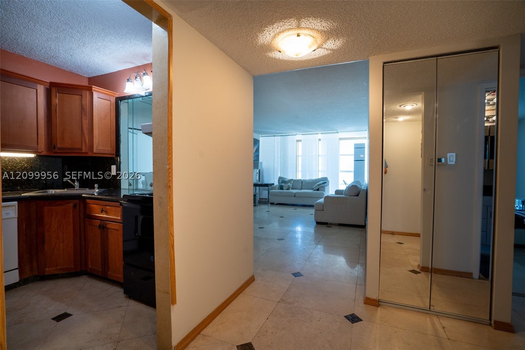 Photo of 701 Three Islands Blvd #506, Hallandale Beach, FL 33009 (MLS # A12099956)