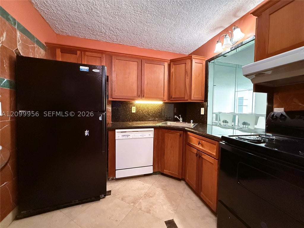 Photo of 701 Three Islands Blvd #506, Hallandale Beach, FL 33009 (MLS # A12099956)