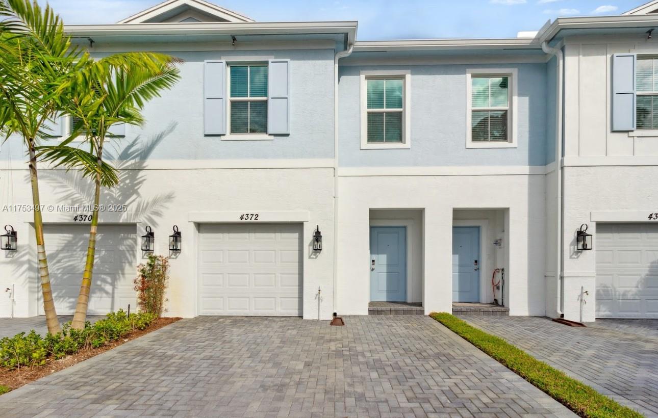 EIGHT WEEKS of FREE RENT! Welcome to Boatman Hammock, a brand-new community of townhomes for rent in Lake Worth, Florida. Enjoy the convenience and amenities of renting and the comfort of the privacy of your own home in Palm Beach County. Our 3-bedroom homes with garages are just a short drive from Lake Worth Beach.
Here, you can make your home truly yours. Choose the finishes that speak to you in our brand-new constructions. Every townhome comes complete with a private yard, creating a personal oasis just for you. Ready to see for yourself? Explore our homes for rent to find your perfect match.