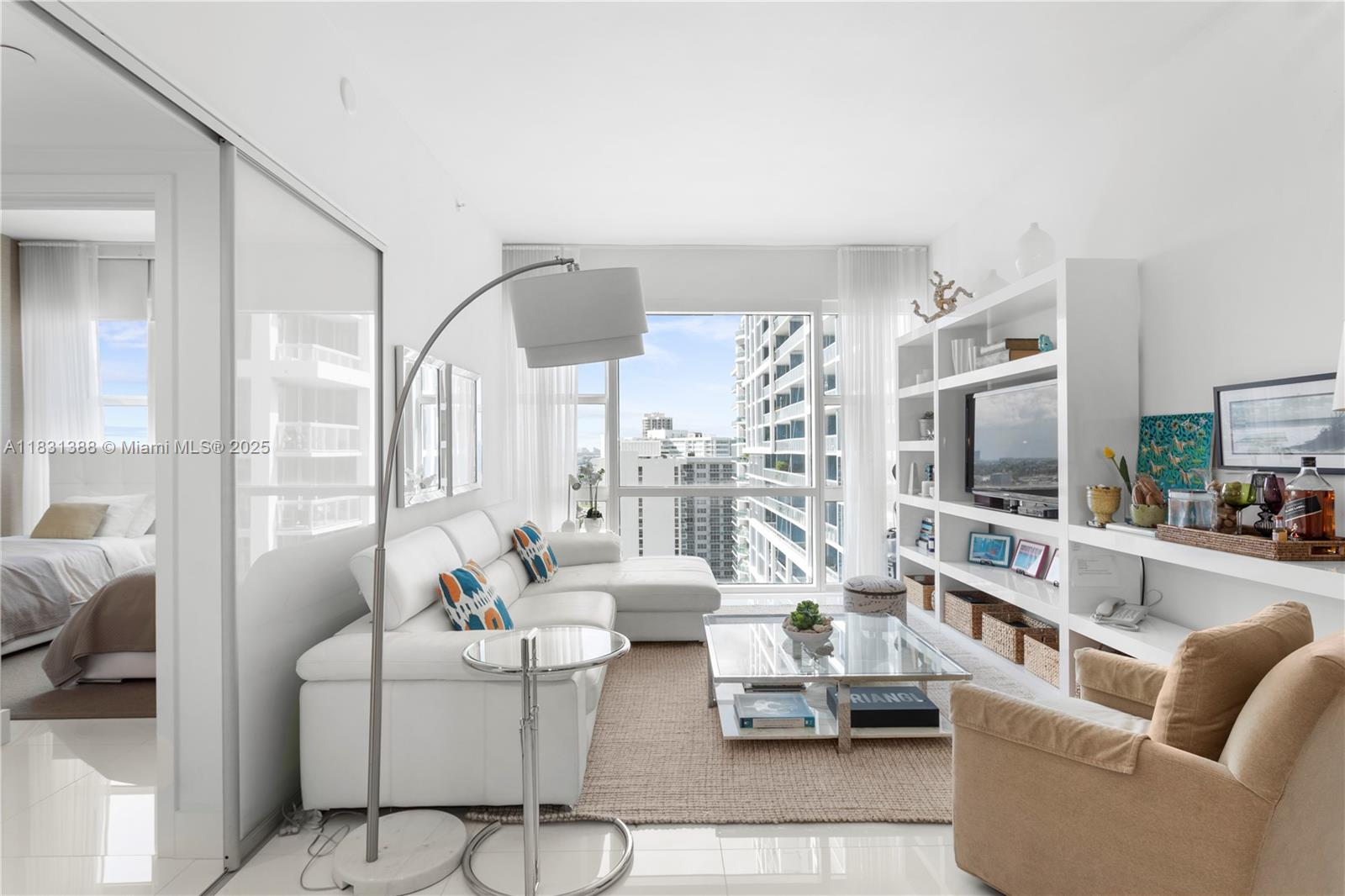 Carillon Miami Wellness Resort Penthouse. This updated 2 Bedroom/2 Bathroom PH offers creme ceramic tiles throughout with a split floor plan overlooking the pool & city views. Kitchen has Miele & Subzero appliances. All rooms have blackout shades w/sheer curtains and most closets have custom built-ins. Amenities include Private Beach Service, 4 Swimming Pools, Juice Bar, Beauty Salon, Concierge and 24/7 Security & Valet Parking. State of the art Spa, Wellness and Fitness facilities w/all day Classes; Yoga, Spinning, TRX, Zumba, Stress Management and a Jog/Bike Path Along the Beach. Enjoy a Healthy Lifestyle Community.