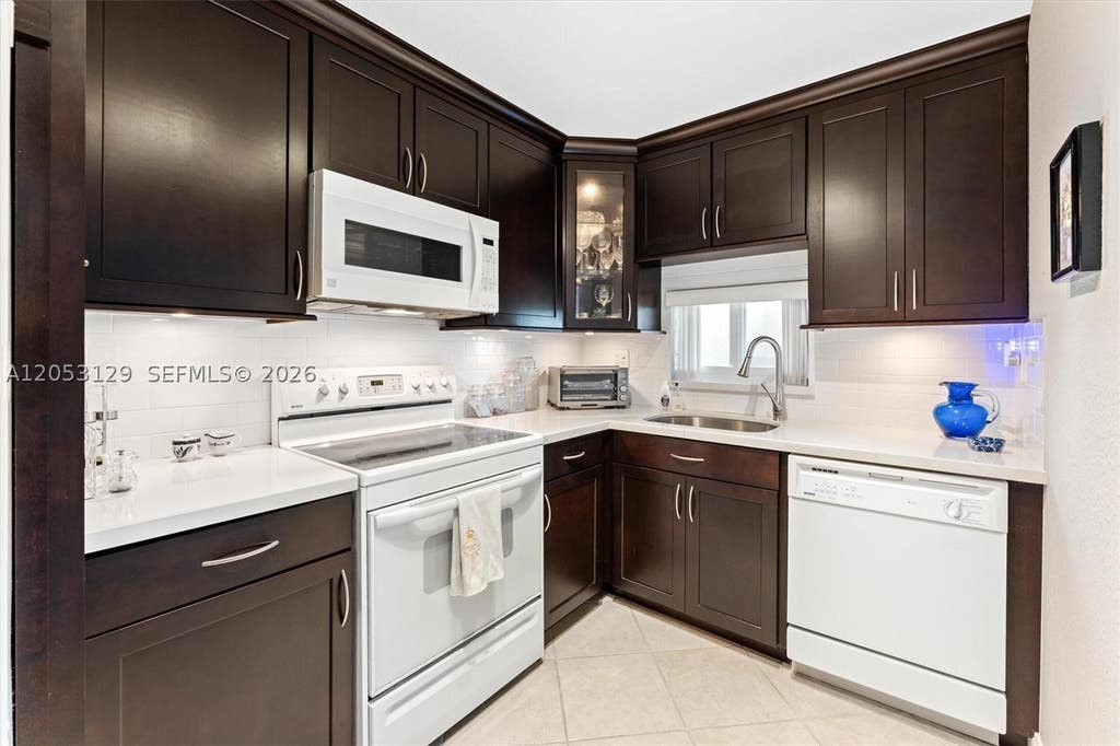 Photo of 8990 S Hollybrook Blvd #210, Pembroke Pines, FL 33025 (MLS # A12053129)