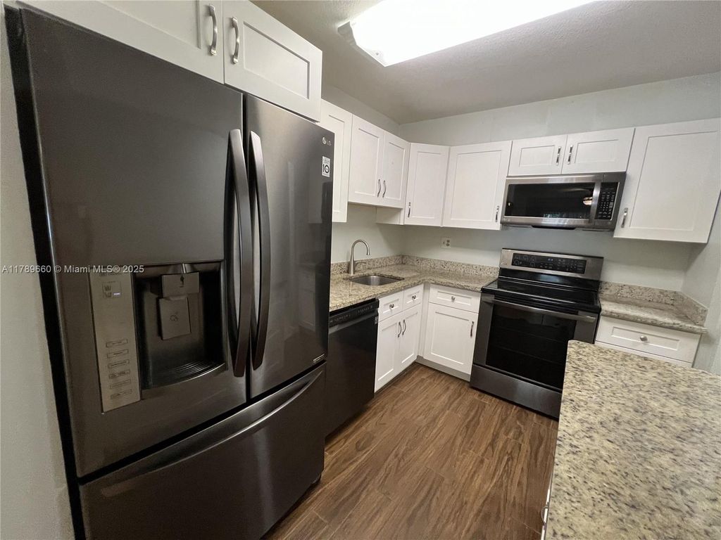 Photo of 4354 NW 9th Ave #13-1C, Deerfield Beach, FL 33064 (MLS # A11789660)