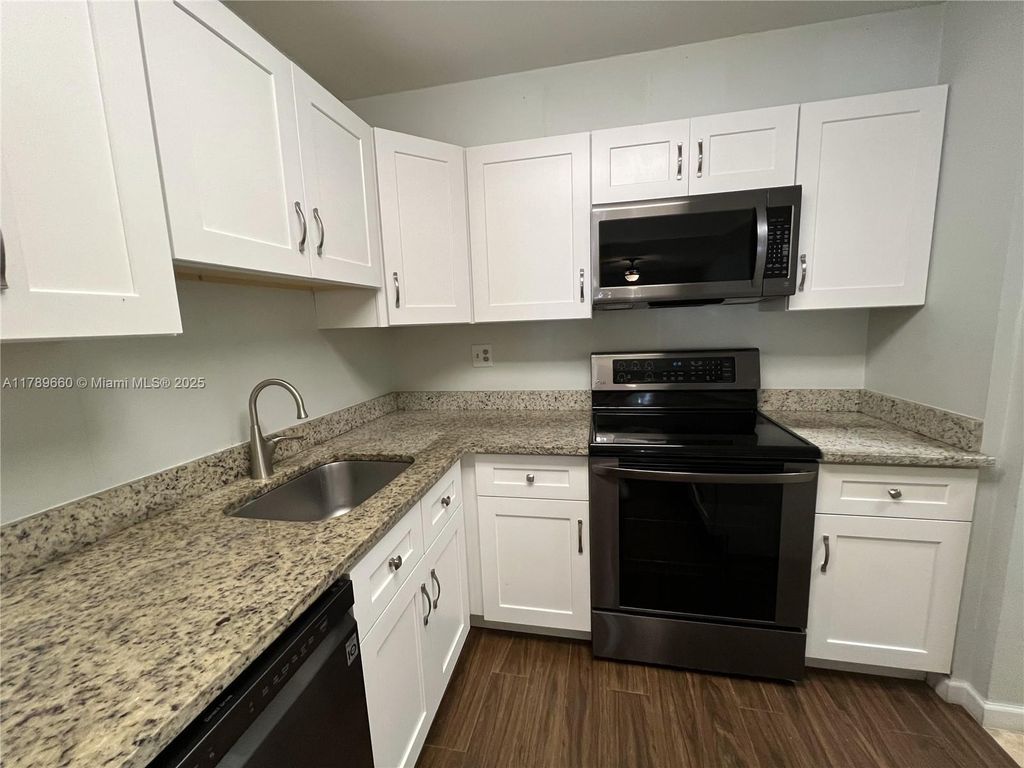 Photo of 4354 NW 9th Ave #13-1C, Deerfield Beach, FL 33064 (MLS # A11789660)