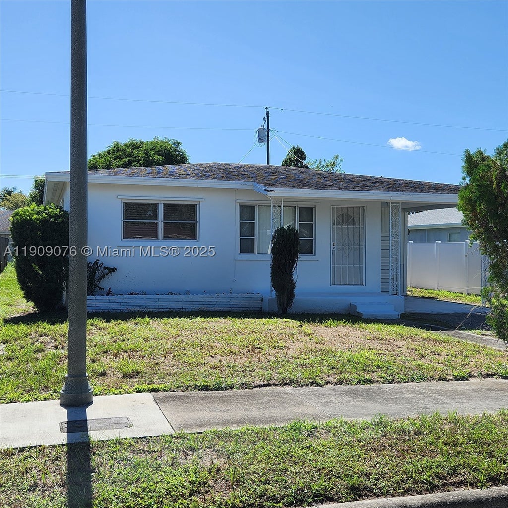 Photo of 1547 W 10th St, Riviera Beach, FL 33404 (MLS # A11909076)