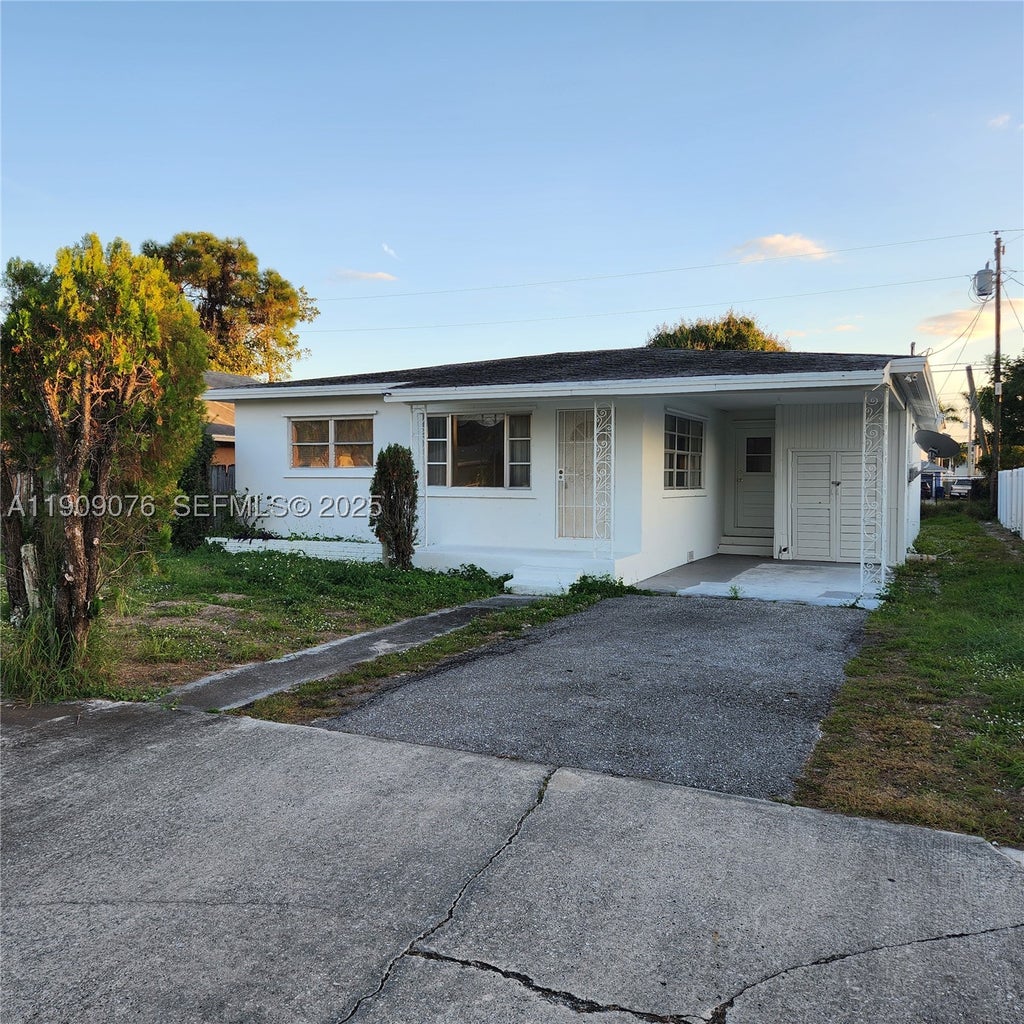 Photo of 1547 W 10th St, Riviera Beach, FL 33404 (MLS # A11909076)