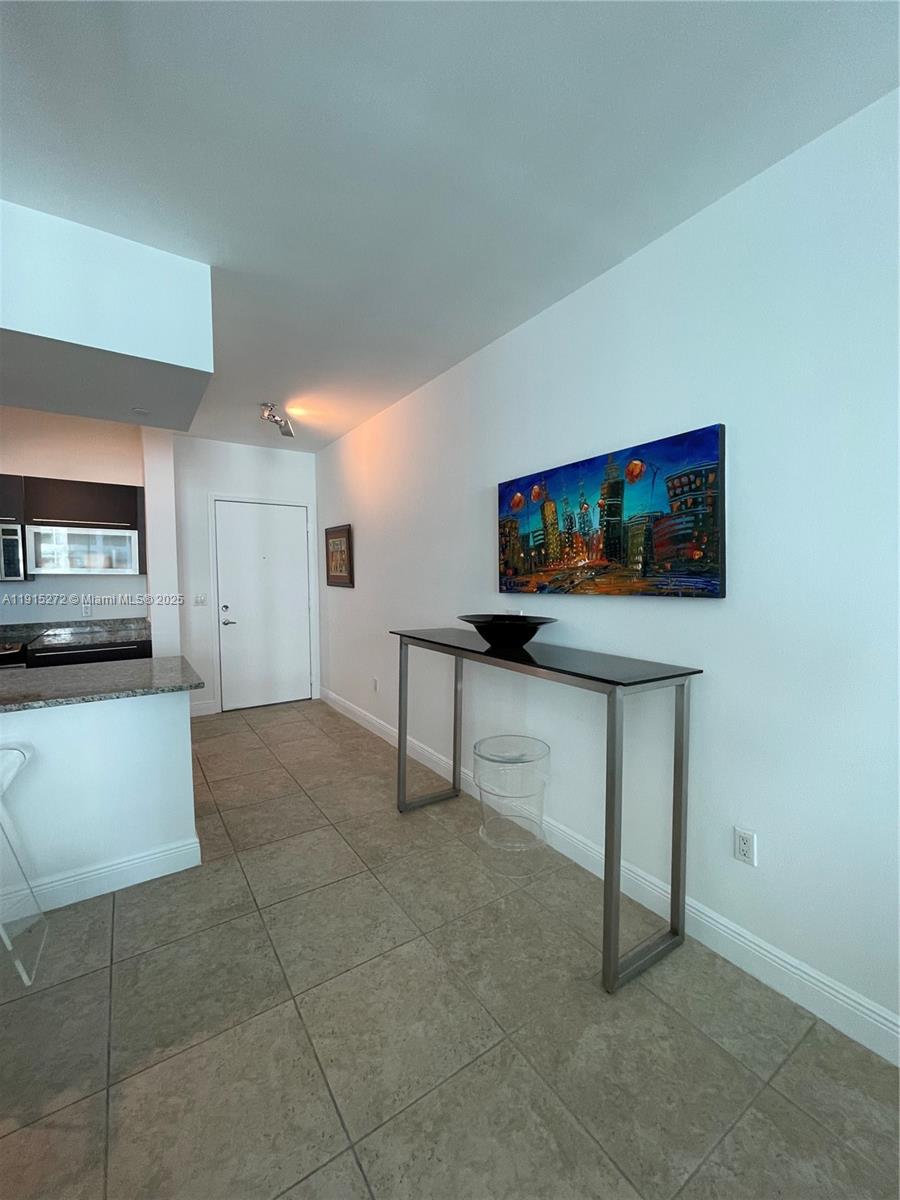 THE PLAZA 901 BRICKELL CO - Residential Lease