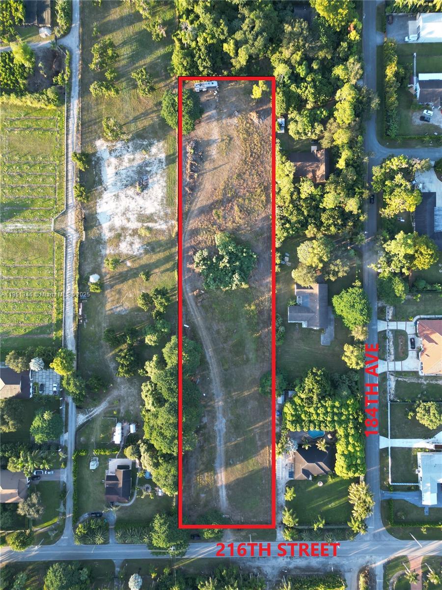 2.86-acre lot near Krome Ave zoned EU-1—build your dream home, family compound, or nursery. 170 ft frontage on busy SW 216th St. Seller financing available with only 20% down. No HOA. Endless potential in a prime location!