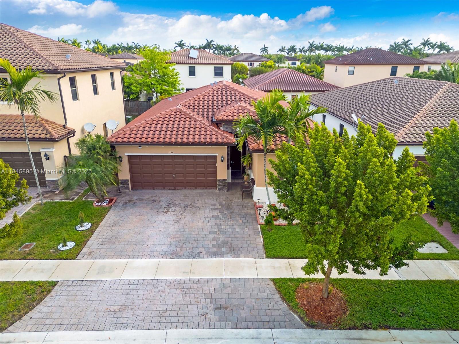 Welcome to your dream home in the heart of a vibrant community! This stunning single-family home boasts 3
spacious bedrooms and 3 luxurious bathrooms, including a master ensuite. The 2-car garage with extended
driveway provides ample space for your vehicles and storage needs, while the community pool and gym just a
short walk away, offers a refreshing oasis just steps from your front door. Stay cool and comfortable year-round
with the brand-new A/C unit installed in 2023 and rest easy knowing your home is protected with HIGH-IMPACT
WINDOWS. Step outside onto the covered patio and soak in the sunshine or host a barbecue with friends and
family. Don't miss your chance to make this house your forever home!