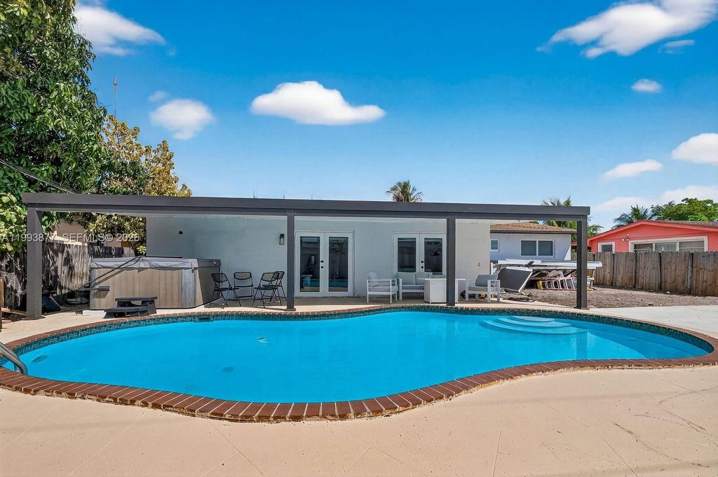 Photo of 330 NW 195th Ter, Miami Gardens, FL 33169 (MLS # A11993877)