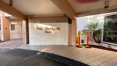 Photo of 1300 Saint Charles Pl #202, Pembroke Pines, FL 33026 (MLS # A12063029)