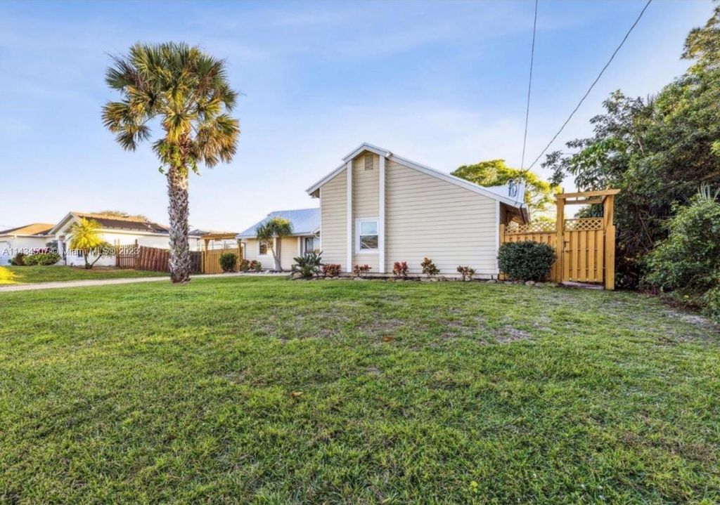 Photo of 968 SW Sultan Dr, Port Saint Lucie, FL 34953 (MLS # A11434507)