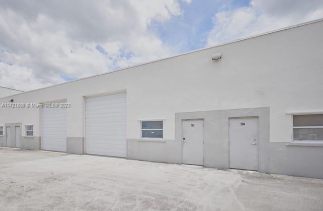 Updated large warehouse in the gated complex of Kendall Pines. Warehouse features large access door with very tall clearance, much higher than similar properties in the area. Great for personal or automobile storage. Unit has been freshly repainted and features a full bathroom. The complex is gated with excellent security and privacy, also features a ton of parking. Air conditioning system is ideal as well, warehouse also has excellent storm protection.