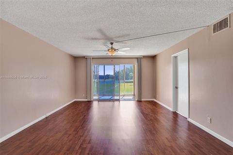 Photo of 12500 SW 6th St #203N, Plantation, FL 33027 (MLS # A11886536)