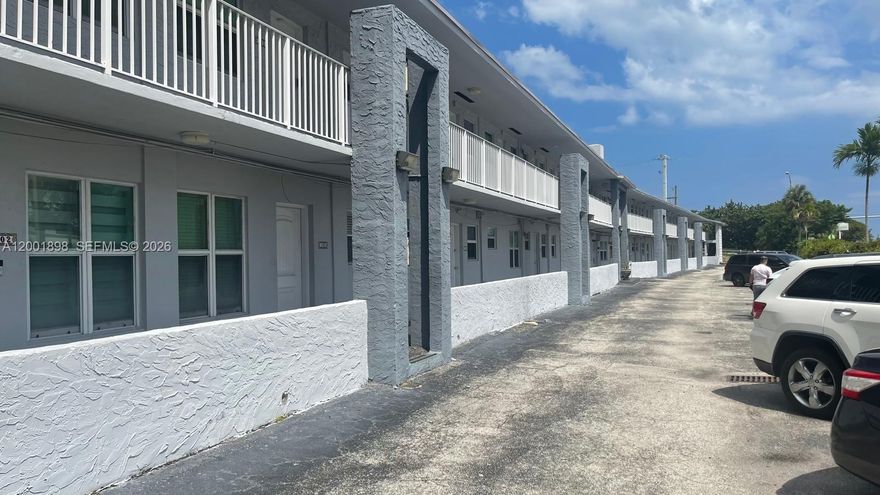 Discover waterfront living in this charming studio located in the desirable Keystone Manor condominium in North Miami. This bright and inviting unit features a beautiful canal view, creating a peaceful atmosphere right from your living space. The kitchen is equipped with a white electric range and a sleek black refrigerator, offering a clean and functional setup. The open layout maximizes space and natural light, making it perfect for comfortable everyday living or as a great investment opportunity. Conveniently located near major highways, shopping, dining, and just minutes from the beach, this studio offers both tranquility and accessibility in one of North Miami’s most sought-after areas.