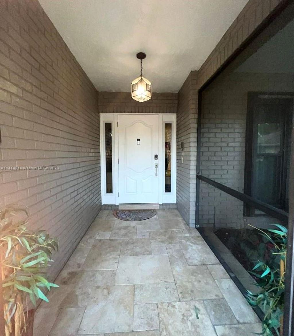 Photo of 3930 NW 72nd Dr, Coral Springs, FL 33065 (MLS # A11444214)