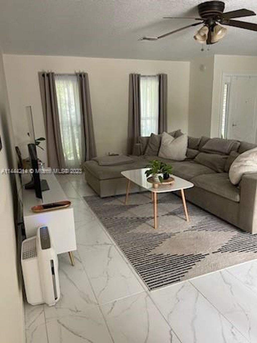 Photo of 3930 NW 72nd Dr, Coral Springs, FL 33065 (MLS # A11444214)