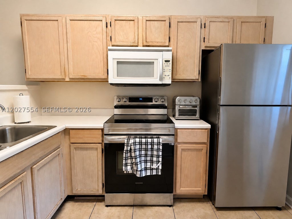 Photo of 3680 NW 91st Ln #3680, Sunrise, FL 33351 (MLS # A12027554)