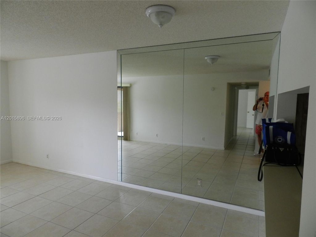 Photo of 10001 W Atlantic Blvd #216, Coral Springs, FL 33071 (MLS # A12015896)