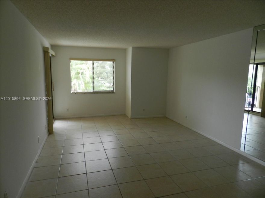 Bright and spacious 2 bedrooms 2 bathrooms apartment located in the heart of Coral Springs. This beautiful unit features tile flooring throughout, an open-concept kitchen overlooking the living area, creating a seamless and inviting space. Enjoy plenty of natural light- Private balcony with relaxing pool views and functional layout that integrates all living spaces beautifully. The kitchen is fully equipped with stove, oven, dishwasher, refrigerator, garbage disposal and everything needed for comfortable everyday living. The unit also includes a washer and dryer, AC, water heater. Close to shopping, dining, public transportation.