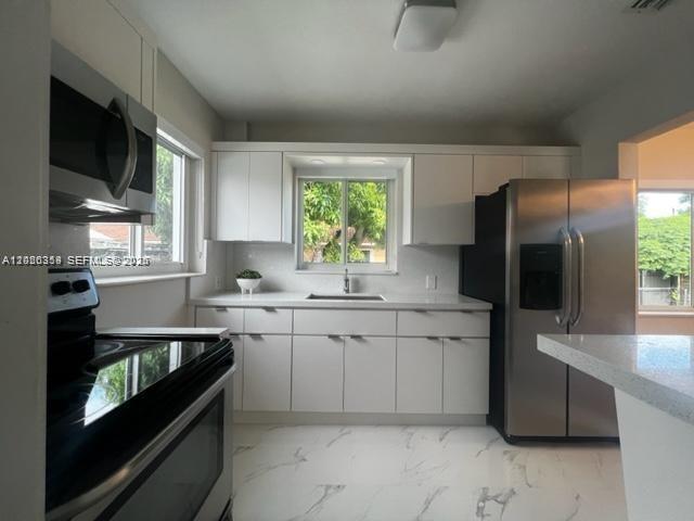 AMND MIAMI SUBURBAN ACRES - Residential