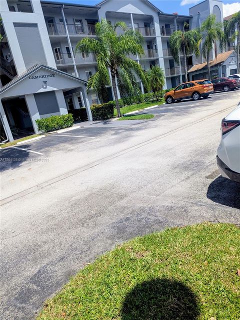 Photo of 12701 SW 14th St #308J, Pembroke Pines, FL 33027 (MLS # A11864138)