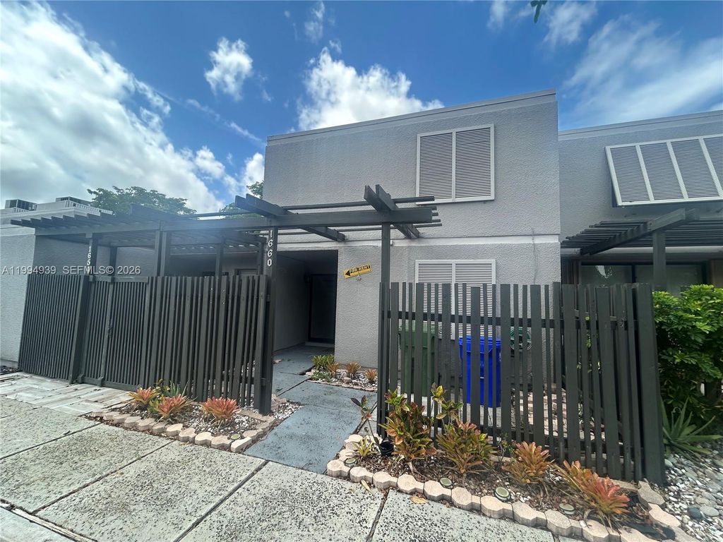 Photo of 1660 NW 113th Way, Pembroke Pines, FL 33026 (MLS # A11994939)