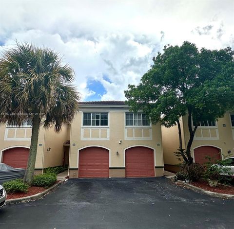 Photo of 2424 Centergate Dr #204, Miramar, FL 33025 (MLS # A11872400)