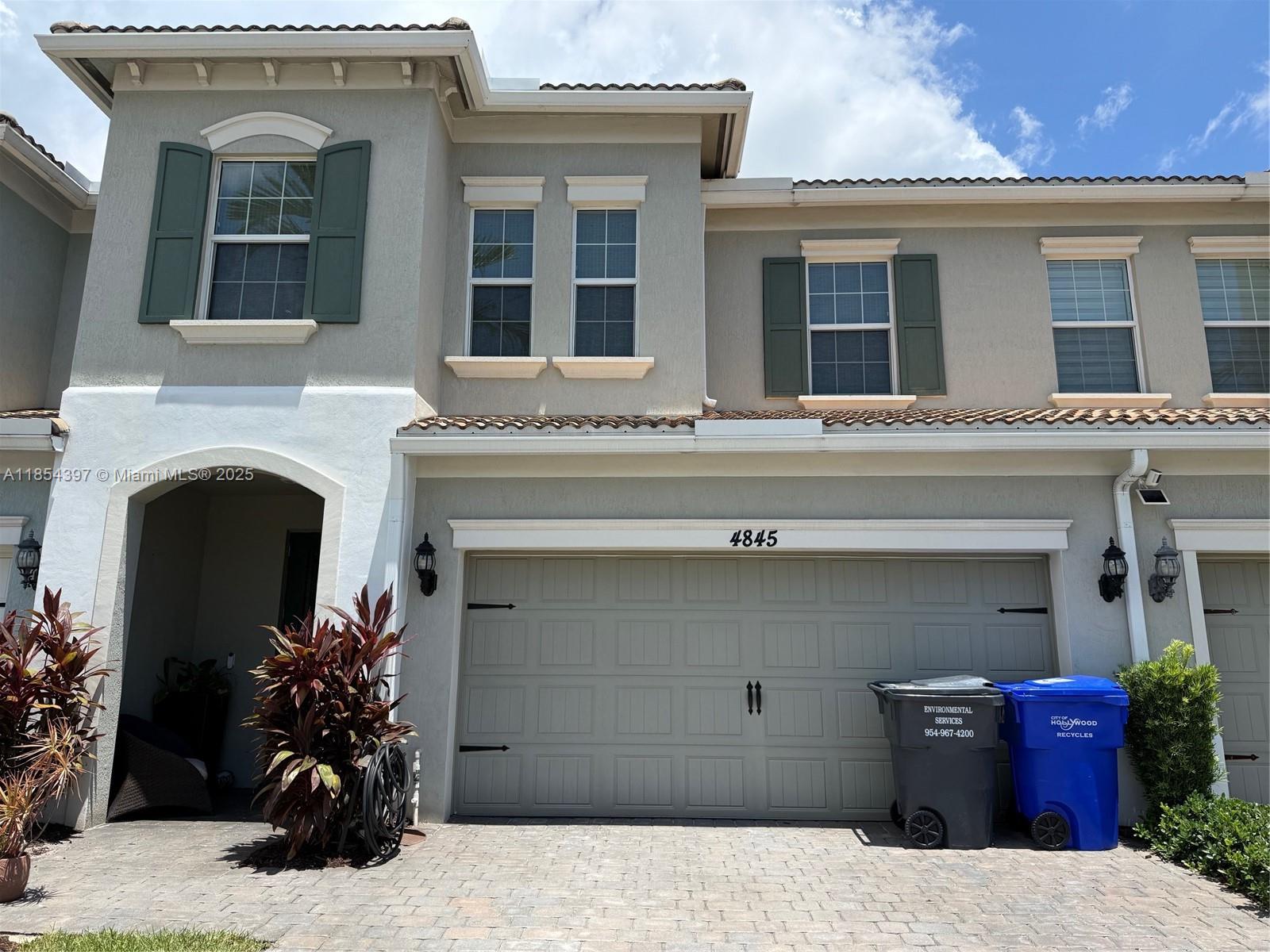 Highly upgraded and well-kept two story two car garage townhouse at prestigious Parkview at Hillcrest community. Fenced backyard with lake views, laminated floors upstairs, security alarm, hurricane impact doors and windows, high ceilings, the residence is full of light and boasts open floorplan and upgraded kitchen.