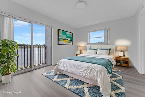 Photo of 8560 N Sherman Cir #208, Miramar, FL 33025 (MLS # A11830673)