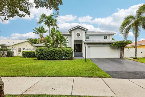 Photo of 5821 Hawkes Bluff Ave, Davie, FL 33331 (MLS # A12099089)
