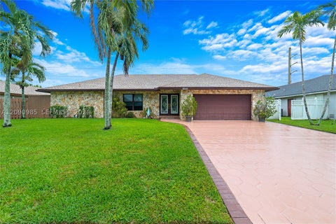 Photo of 1250 NW 76th Ave, Plantation, FL 33322 (MLS # A12090985)