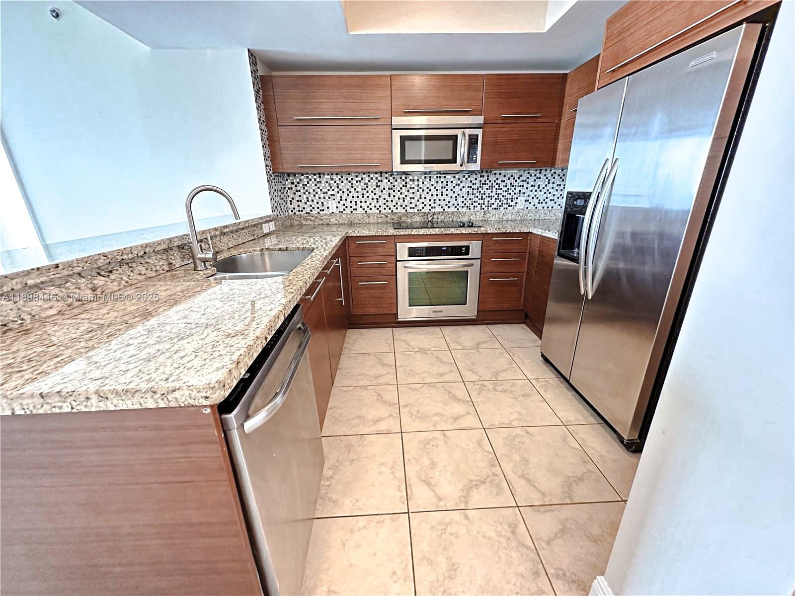 TAO SAWGRASS CONDOMINIUM - Residential Lease