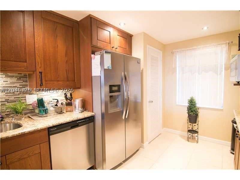 Photo of 4030 W Palm Aire Dr #505, Pompano Beach, FL 33069 (MLS # A12040326)