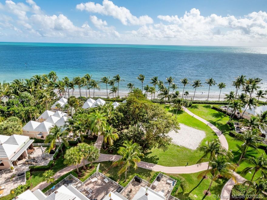 CASUAL ELEGANCE describes this 5,207 sq. ft., right-smack-on-the-beach and reconfigured to perfection, Mansion in the Sky. Sweeping views of beach. Expansive living room, dining room, kitchen, terraces and family areas flow together for gracious entertaining. Four bedrooms en-suite plus library and staff quarters. Also includes a wine cellar, fur storage room and four garage spaces. Ocean Club is a full service building with Tennis, Spa, Valet and Private Concierge service round the clock.