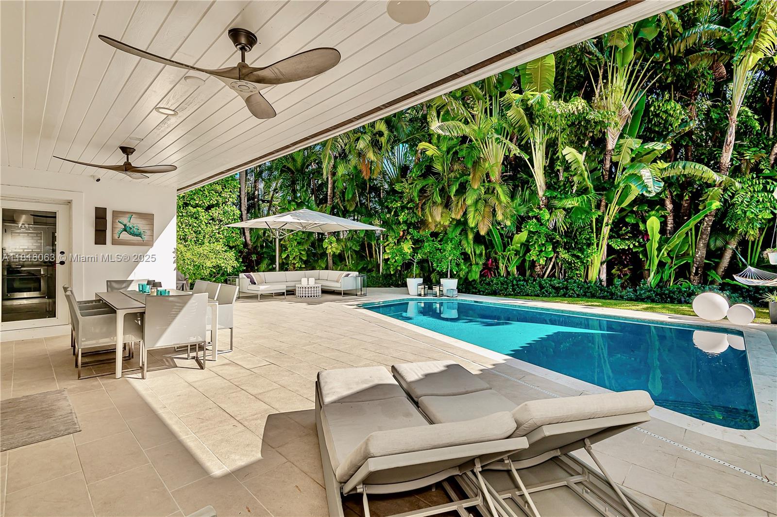 Fully renovated 5 Bedroom/ 3.5 Bathroom one story single family home on beautiful Key Biscayne. Home offers formal dining room, large open living room overlooking pool and tropical garden, kitchen with breakfast area, lots of natural light, plantation shutters through out ,hurricane impact windows and doors, modern polished concrete floors throughout, beautiful landscaped lot, parking for up to 4 cars, inviting tropical backyard oasis, enjoy complete privacy, newly renovated and heated saltwater pool ,covered outside patio and dining area with barbecue perfect for outdoor dining, relax at your separate cosy sitting area with Tucci Umbrella overlooking tropical garden, Sonos sound system inside home as well as outside by dining and pool area. Come enjoy this beautiful Oasis.