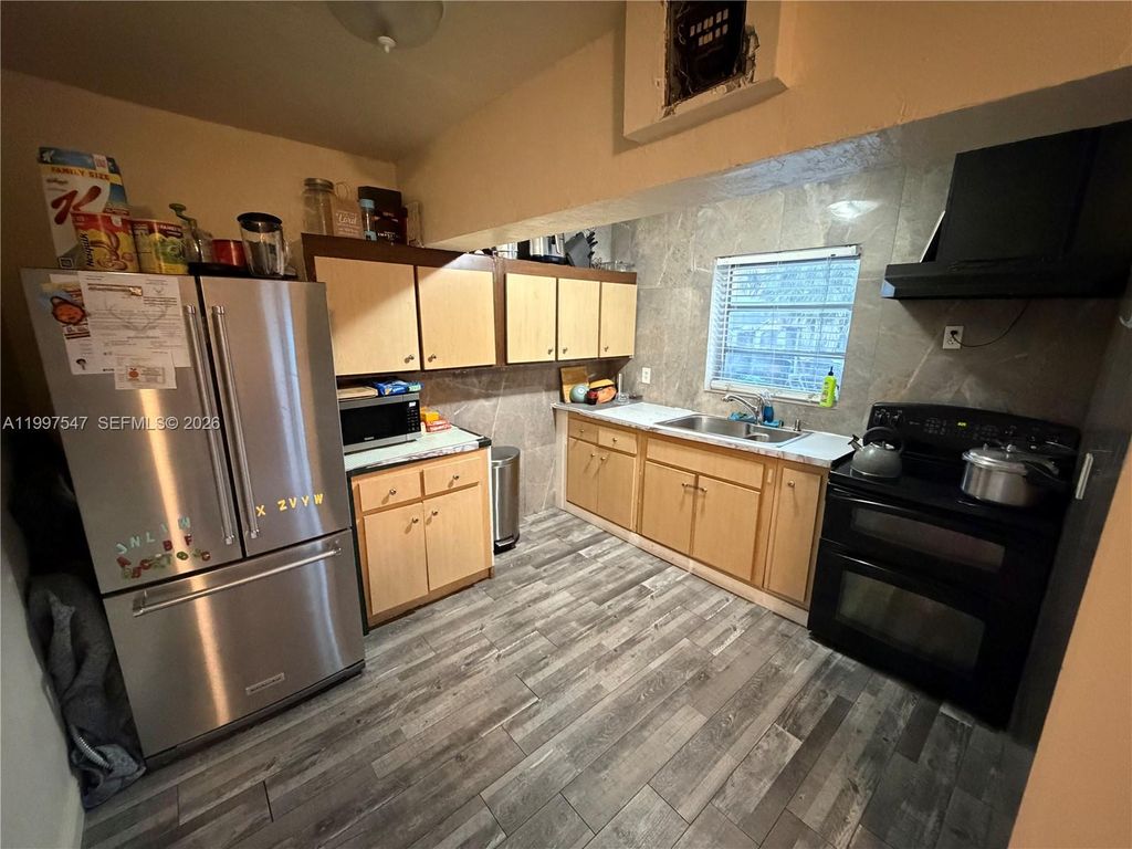 Photo of 648 NW 2nd Ter, Deerfield Beach, FL 33441 (MLS # A11997547)