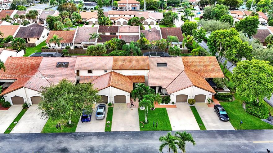 Located in the desirable gated community of Kings Court, this beautifully remodeled 3-bedroom, 2.5-bath townhouse with a 1-car garage is perfect for family living in the heart of Kendall. Features include two master bedrooms—one upstairs and one downstairs—new floors, updated baths, a modern kitchen, Toto toilet, newer roof, and two-zoned A/C. The private fenced patio is ideal for relaxing or entertaining. Kings Court offers an extremely low maintenance fee, fitness center, heated pools, tennis and handball courts, clubhouse, 24-hour gated security, and professional landscaping. Located near top-rated schools, parks, shops, and expressways.